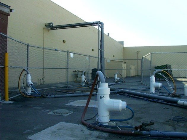 Thermal wellheads and vapor conveyance at Carson Plaza, Carson, California